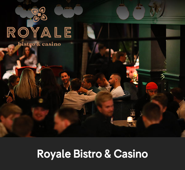 Kvällsstämning med gäster i bar- och restaurangmiljö på Royale Bistro & Casino