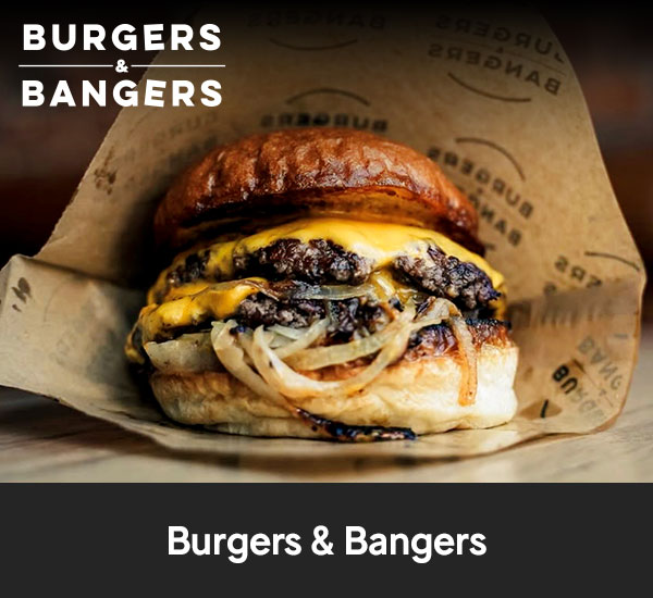 Hamburgare med ost och karamelliserad lök på bröd från Burgers & Bangers